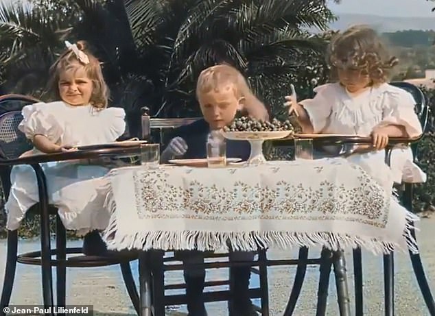 The clip also showed three children sitting at a table and enjoying some food